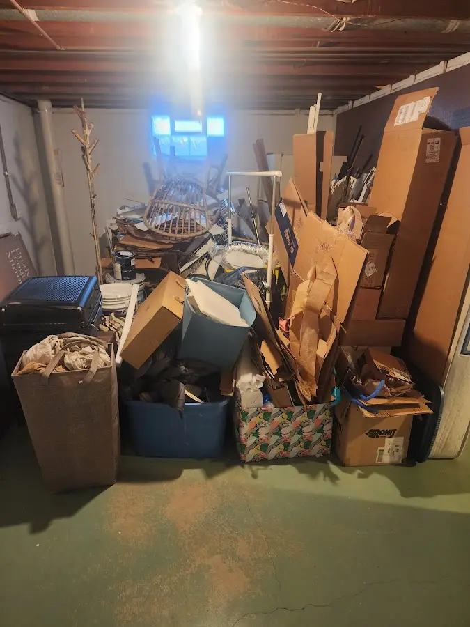 Roll-off dumpster container at job site for 2 Yard Dumpster Rental in Delta